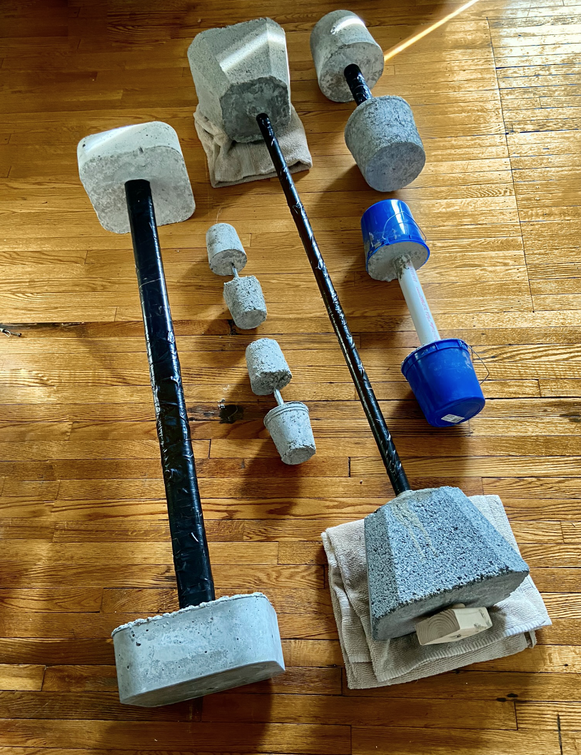 weights and dumbells homemade out of cement